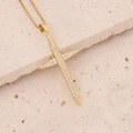 Detailed close-up of 18K gold cross pendant necklace with micro-pave white zircon stones - Long Pavé Set Cross Style (3#)