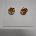 Three-ring twisted knot stud earrings in golden finish on jewelry card display - 8.5# Style