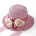 Pink straw sun hat for women featuring delicate floral accents and elegant ribbon - Pearl Style Leather Pink