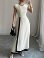 Elegant sleeveless cream dress with black trim and side slit for a sophisticated look - S / Apricot