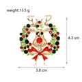 Kerst rendier krans broche met rode strassteentjes en strik van hoogwaardig metaal - Rendier Krans (C442-A)