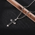 Detailed view of silver and black cross pendant on a textured dark background - XL16 / Silver Black Alternating Cross / Silver Black