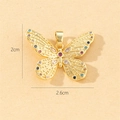 Detailed size view of a gold butterfly pendant with colored gems, 2cm x 2.6cm - Style D-Colored Gemstones (2x2.6cm)