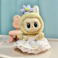 Labubu plush in a purple floral dress with bear buttons and a matching flower headband - Pink Dress With Pendant / First And Second Generation Keychains Are Compatible With La Cloth Dolls. Dolls Not Included.