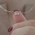 Minimalist S925 sterling silver bow necklace with pear-cut crystals in 14k gold finish - 42cm+3cm Length / 14K Gold
