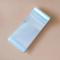 Close-up of bundled transparent OPP plastic bags with hanging holes for jewelry packaging - 8*18cm-With Hanging Hole-Double Layer 90 Microns (100 Pieces/Pack)