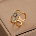 Close-up of gold eye ring with blue sapphire and pavé cubic zirconia gemstones - Gold Evil Eye Ring (10198)