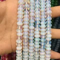 Translucent synthetic opal rondelle spacer beads with blue iridescent glow effect - 5*8mm (Per Strand) / Opalite
