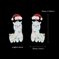 Detailed size view of alpaca earrings with red Santa hat and festive Christmas light print - White Alpaca