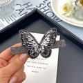 Eleganter großer Schmetterling-Haarclip mit Kristall-Strasssteinen auf schwarzem Tablett - Schwarze Schleife Federclip / Schwarz