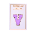 Close-up of purple chenille letter V patch with gold glitter border and adhesive back - Letter V / Purple
