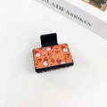 Gothic Halloween hair claw clip featuring pumpkin gnome and bat illustrations on orange panel - Halloween #5 - Square