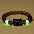 Detail shot of glowing green beads and black cat charm on this handmade stone bracelet - Smoky Quartz (Brownish)