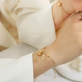 Bracelet doré réglable avec un pendentif porte-bonheur classique et une gourde - Bracelet Doré 25cm