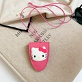 Pink lychee grain leather neck pouch featuring a 3D cartoon cat on a prop background - Pink