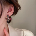 Colorful crystal butterfly stud earrings shown on a model for a stylish look - Dark Red
