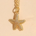 Starfish pendant necklace in golden finish with sparkling zircon pave setting - Zirconia Starfish