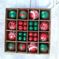 Top view of 16-compartment box with red and green Christmas balls in various patterns - Red + Green 44pcs Gift Box Set