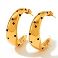 Golden C-shaped stainless steel hoop earrings with retro polka dot surface detail - Gold With Black Zirconia (KDE880)