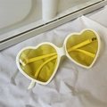 White heart shaped sunglasses with translucent yellow lenses in a retro oversized frame - Large Heart Beige Frame