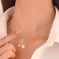 Elegant gold rose zircon pendant necklace with sparkling crystal flower on a model - Pavé Zirconia Leaf Wave Chain Style / Imitation Gold (K-170)