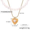 Detail of gold heart pendant with hammered texture and freshwater pearl on layered chain - Heart Pearl Pendant Double Layer / Gold Necklace-Heart Double Layer