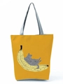 Detailed view of yellow canvas tote bag featuring cute cat on banana illustration - Banana Cat Print (hl3561)