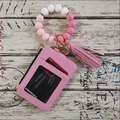 Detail of pink leather card wallet set with gradient silicone beads and tassel charm - Sakura Pink