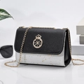 Women's crossbody bag featuring black and silver glitter panels with a gold crown crest - Without Pendant / Black