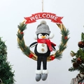 Christmas penguin wreath with welcome banner and pine needles for door decoration - Grey Hat Penguin Wreath