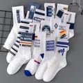 Athletic crew socks for men featuring white and blue colors with vintage letter patterns - Unisex (35-44) / 14 Styles Mixed Graffiti