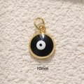 Macro detail of 10mm round gold-plated Evil Eye pendant with black and white enamel - A0274 Gold Black Eye 10mm