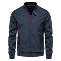 Detail of navy blue pilot jacket with stand-up collar and contrasting red lining interior - S / Navy Blue
