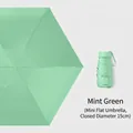 Mini flat mint green folding sun umbrella with a compact 15cm portable storage size - No Box / Light Green