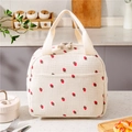 Lunchtasche aus Cord mit Erdbeerdruck und Thermo-Isolierung in cremeweißer Farbe - Kleine Erdbeere