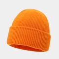 Close-up of orange knit beanie showing detailed ribbed texture and soft warm winter fabric - One Size / Orange