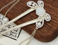 Épingle à cheveux papillon dorée avec perles et long pompon pour style vintage - Papillon en Perles Camélia (94#)