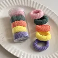 Five colorful fuzzy elastic hair scrunchies with clear storage jar on white ceramic plate - 7# Macaron Twill 5 Pcs in Jar