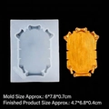 Baroque scroll frame silicone mold with gold resin plaque sample on black background - 15-948 Transparent