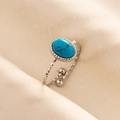Detailed view of bohemian turquoise ring with geometric textured band and silver finish - Silver Base-Sky Blue Stone