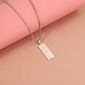 Close-up of a silver stainless steel rectangular bar pendant on a sturdy box chain necklace - Steel Color (12*29mm)(MP564)