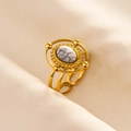 Macro detail of vintage celestial style gold ring with oval white turquoise stone - Gold Base White Turquoise Texture