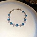 Bracelet ajustable en argent avec zircons bleus et petits détails floraux blancs - Style 70# Argent Bleu Fermoir