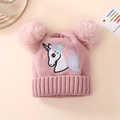 Close-up of pink knit hat with twin faux fur pom-poms and rainbow unicorn embroidery - One Size (1-4Y) / Unicorn - Light Pink