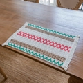 Bohemian hand-woven linen placemat with red and green geometric patterns and fringes - Colorful Pattern