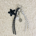 Detail of badminton keychain with shuttlecock, metal racket and woven cord charms - Charm / Badminton Black Star