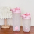 Pink and white protein shaker bottle with mixing ball for fitness and sports gym use - Pink