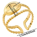 Detail view of adjustable gold stainless steel ring with oval plate and textured bands - J419 / Gold
