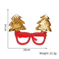 Sparkly red 2026 Christmas glasses with golden trees and Merry Christmas text - Gold Christmas Tree Glasses