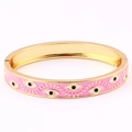Pink enamel evil eye bangle bracelet with gold plating and convenient clasp closure - Pink